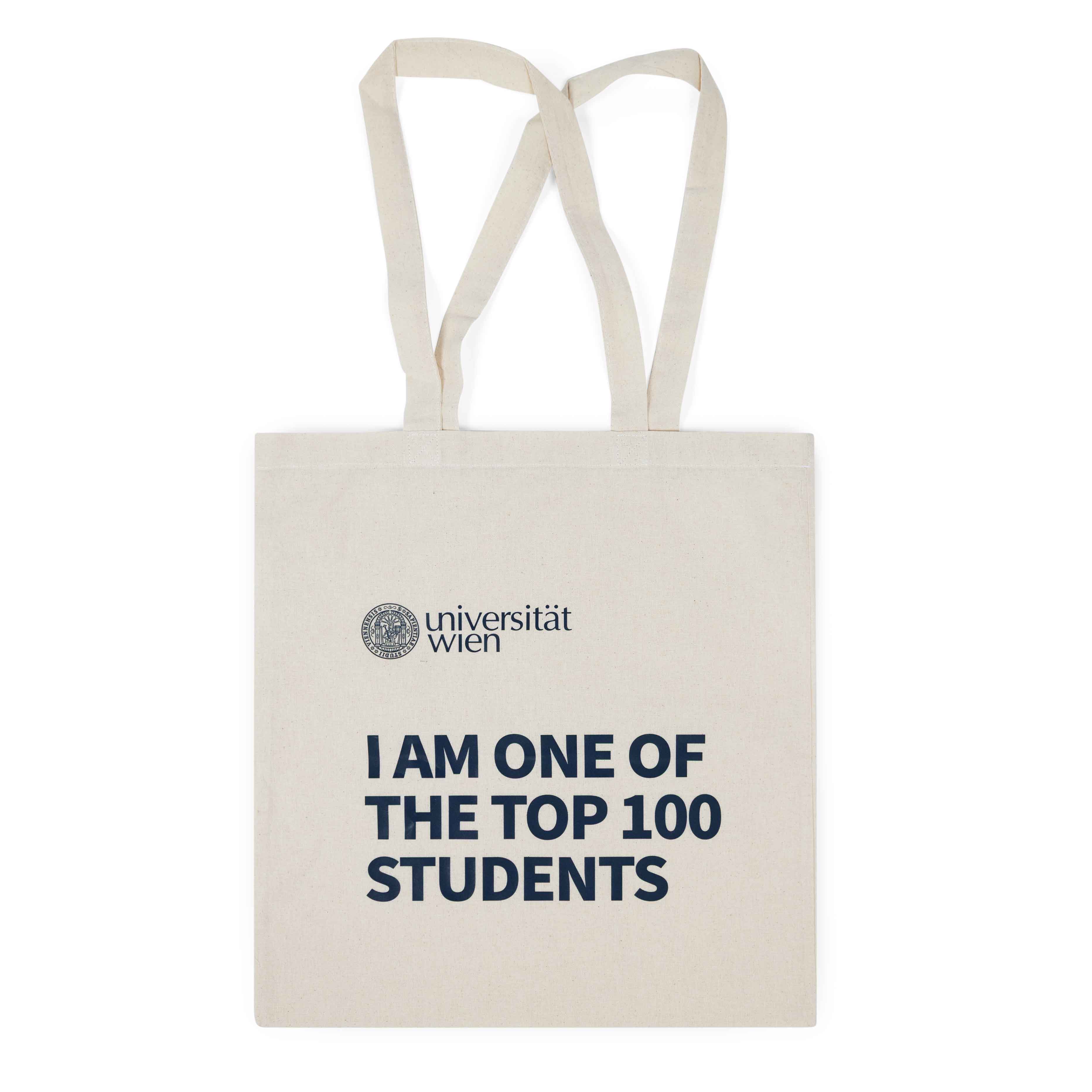 Helle Stoff‑Shopper mit langen Tragegriffen. Aufdruck oben mit Logo der Universität Wien, darunter in großer dunkelblauer Schrift „I AM ONE OF THE TOP 100 STUDENTS“.